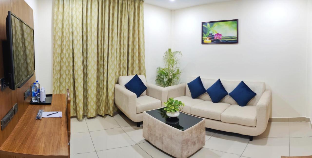Hotel Seapark Kollam Extérieur photo