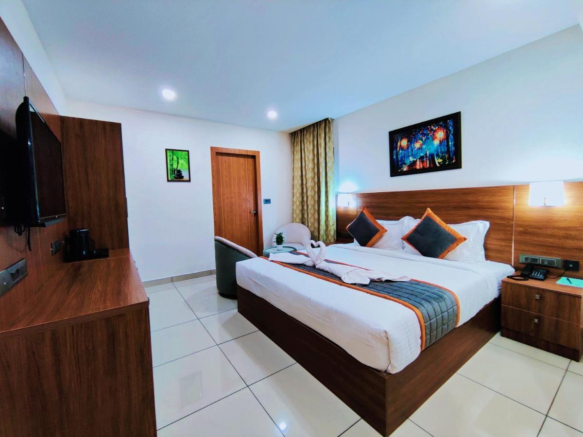 Hotel Seapark Kollam Extérieur photo