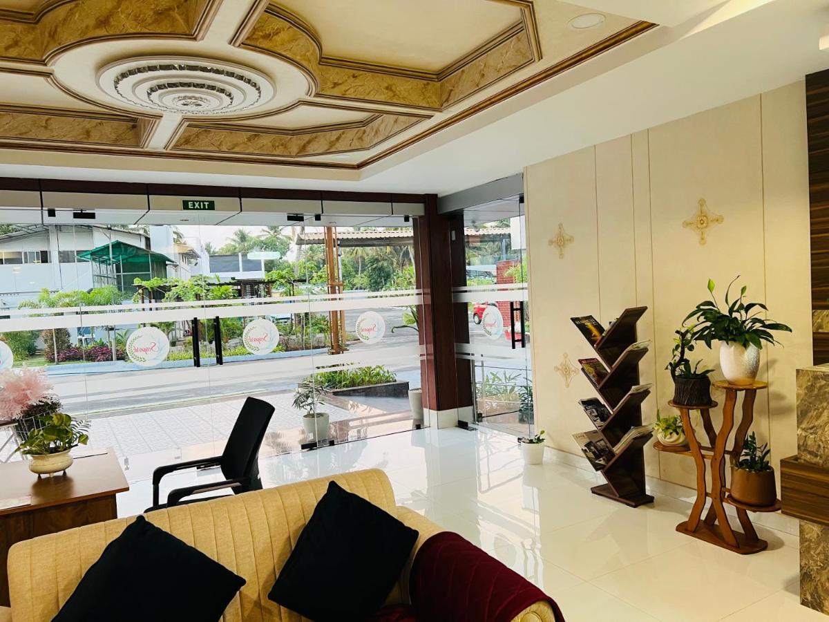 Hotel Seapark Kollam Extérieur photo