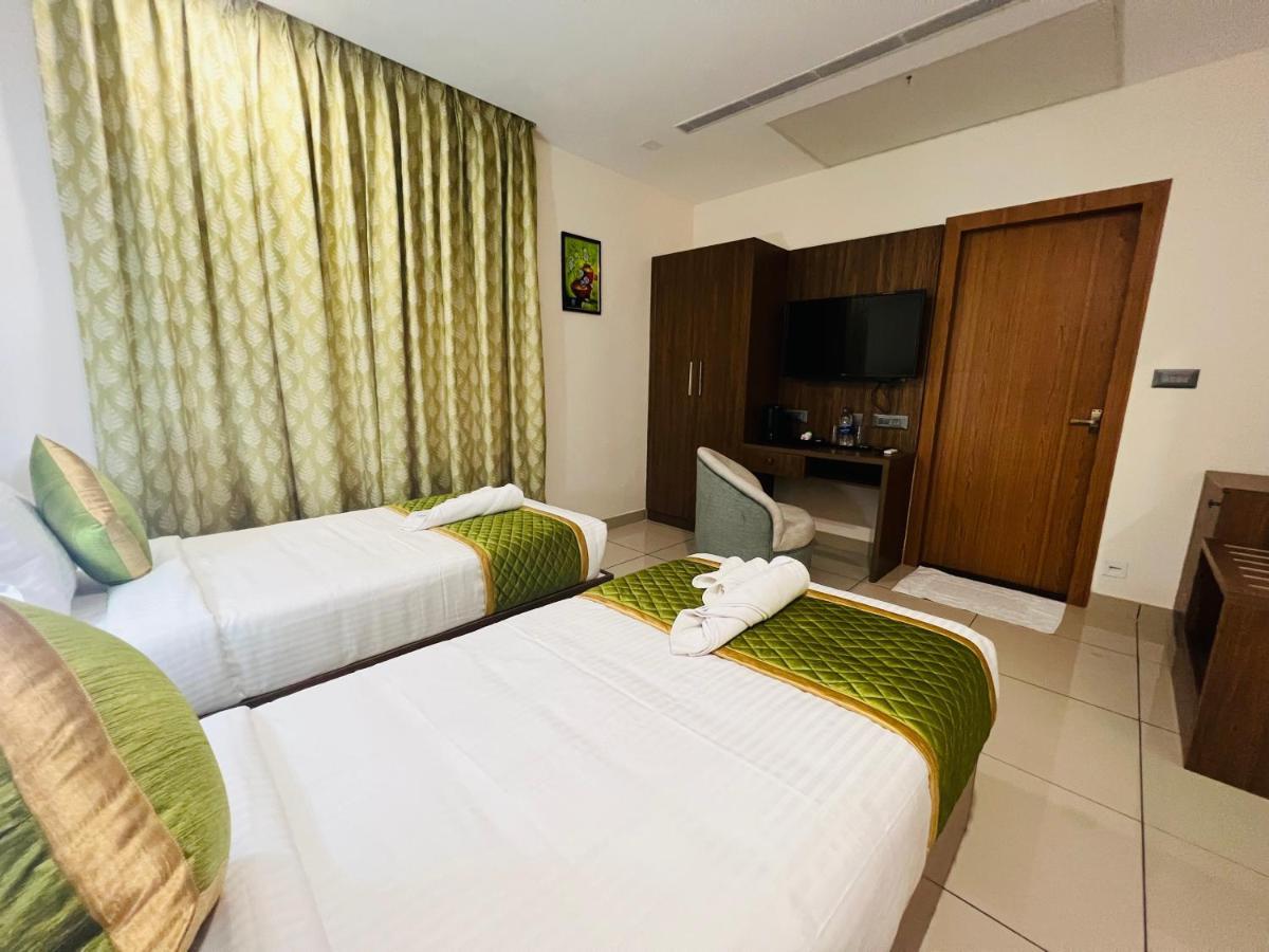 Hotel Seapark Kollam Extérieur photo