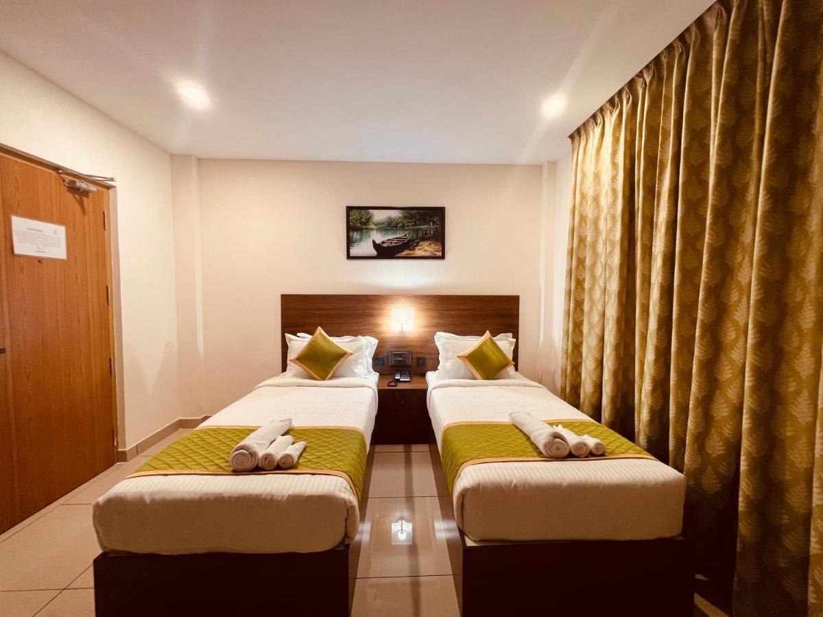 Hotel Seapark Kollam Extérieur photo