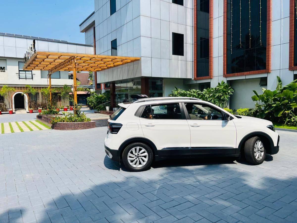 Hotel Seapark Kollam Extérieur photo